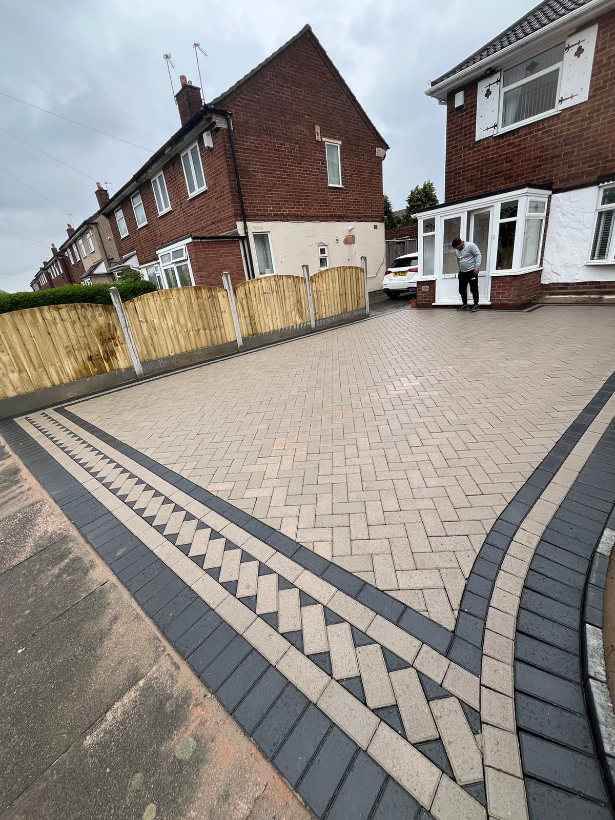 Herringbone block paving driveway with decorative diamond feature border, West Midlands