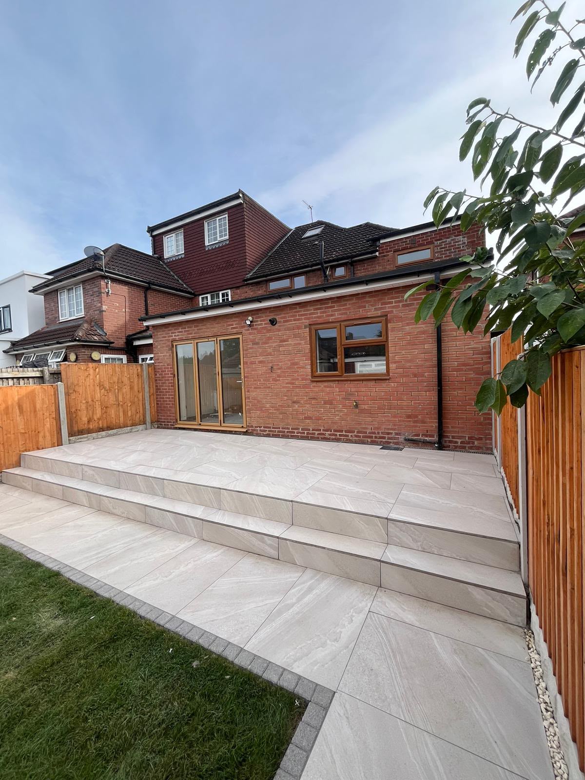 Cream porcelain patio laid on full mortar bed